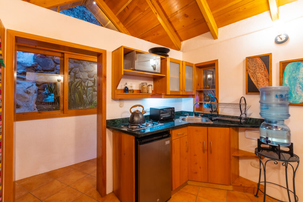 Villa Loft kitchenette with microwave, sink, and mini-fridge